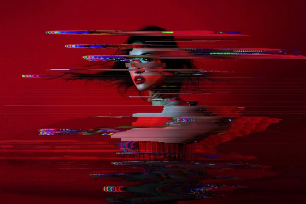 Set against a saturated deep red wall, a female model's form dissolves and warps into jagged, pixelated shards and horizontal glitch bands that slice through her figure like fractured glass. Her body and face partially melt into fragmented layers of digital decay, with subtle RGB separation introducing chromatic fringing reminiscent of an old CRT screen. The fabric of her dress loops rhythmically, mimicking the stuttered frames of a corrupted GIF buffer, creating a surreal, repetitive motion amid the static. Her eyes, rimmed with soft neon glows, convey a subtle mixture of vulnerability and detachment, while her slightly parted lips hint at ambiguous emotion. Horizontal scanlines ripple softly across the composition, overlaying grainy analog textures that evoke worn VHS tapes and malfunctioning screens. The tight framing isolates the glitching figure against the stark red background, emphasizing the tension between organic human fragility and relentless mechanical distortion. This imagery channels cyberpunk aesthetics, blending digital surrealism with nostalgic analog imperfections, evoking themes of fragmented identity, memory erosion, and ephemeral digital existence.