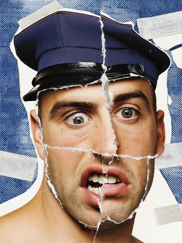 His face is deconstructed into anarchic collage fragments: one eye duplicated and shifted sharply upward near the temple, the other half-rotated and layered above the cheekbone. His nose is split and staggered with a jagged paper tear, creating a stepped effect across the bridge. Two mouths overlap—one snarling, one neutral—displaced off-center below a fragmented, halved ear that appears cut and taped back unevenly. Paper seams and masking tape strips border each facial layer, emphasizing visible disruption and taped reconstruction reminiscent of a punk zine photocopy.
His skin shows realistic roughness: subtle pores, faint stubble around the jaw, and fine lines by the eyes. A classic navy policeman's cap, roughly clipped with visible paper grain, crowns his head. The background offers xerox-style halftone patterns and torn paper edges, layered with tape fragments, producing a gritty, handmade collage vibe imbued with institutional grit and analog tactility.